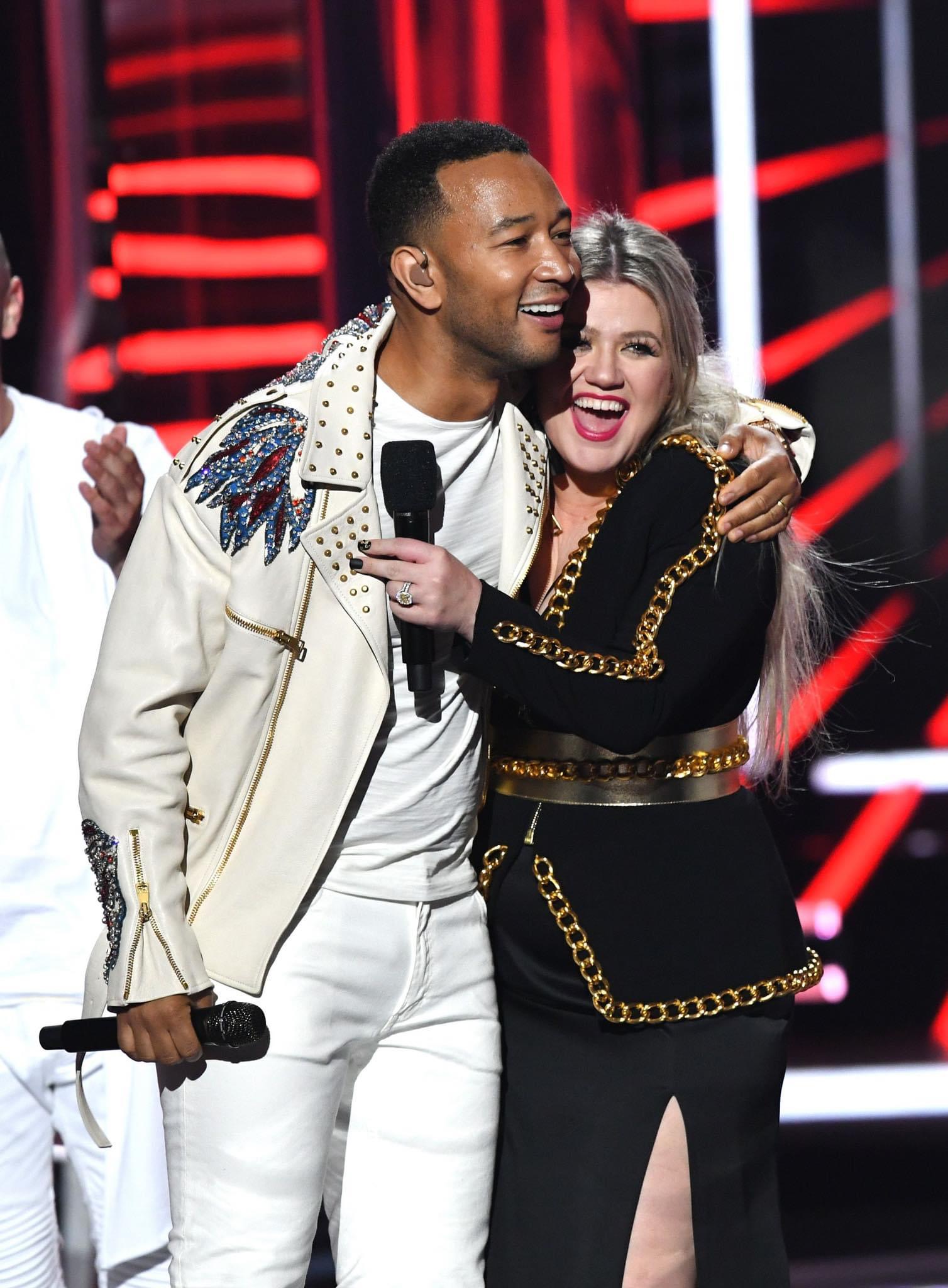 Now They’re Facing The Backlash – John Legend Bash And Kelly Clarkson “God Bless The USA.”