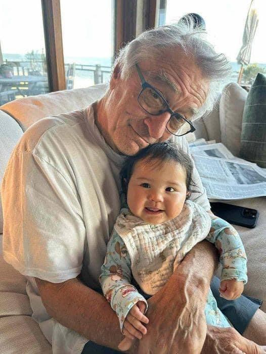 Robert De Niro, 80, and baby daughter Gia, 10 months, snuggle in rare family